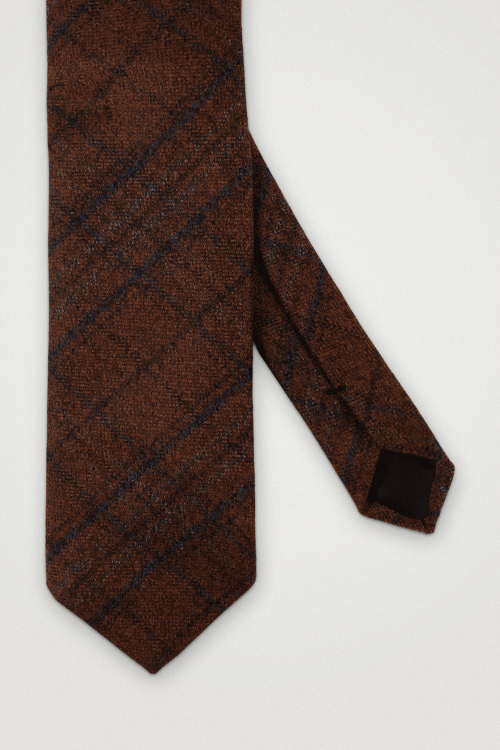 Checker Wool Tie Rust – Amanda Christensen, detalj