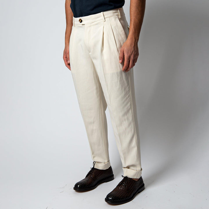 THE REPORTER TWO PLEAT TROUSERS White