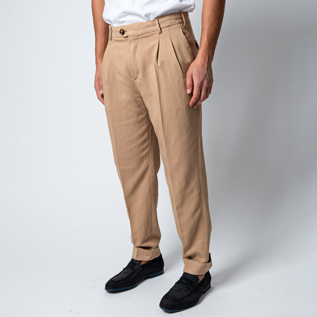 THE REPORTER TWO PLEAT TROUSERS Beige